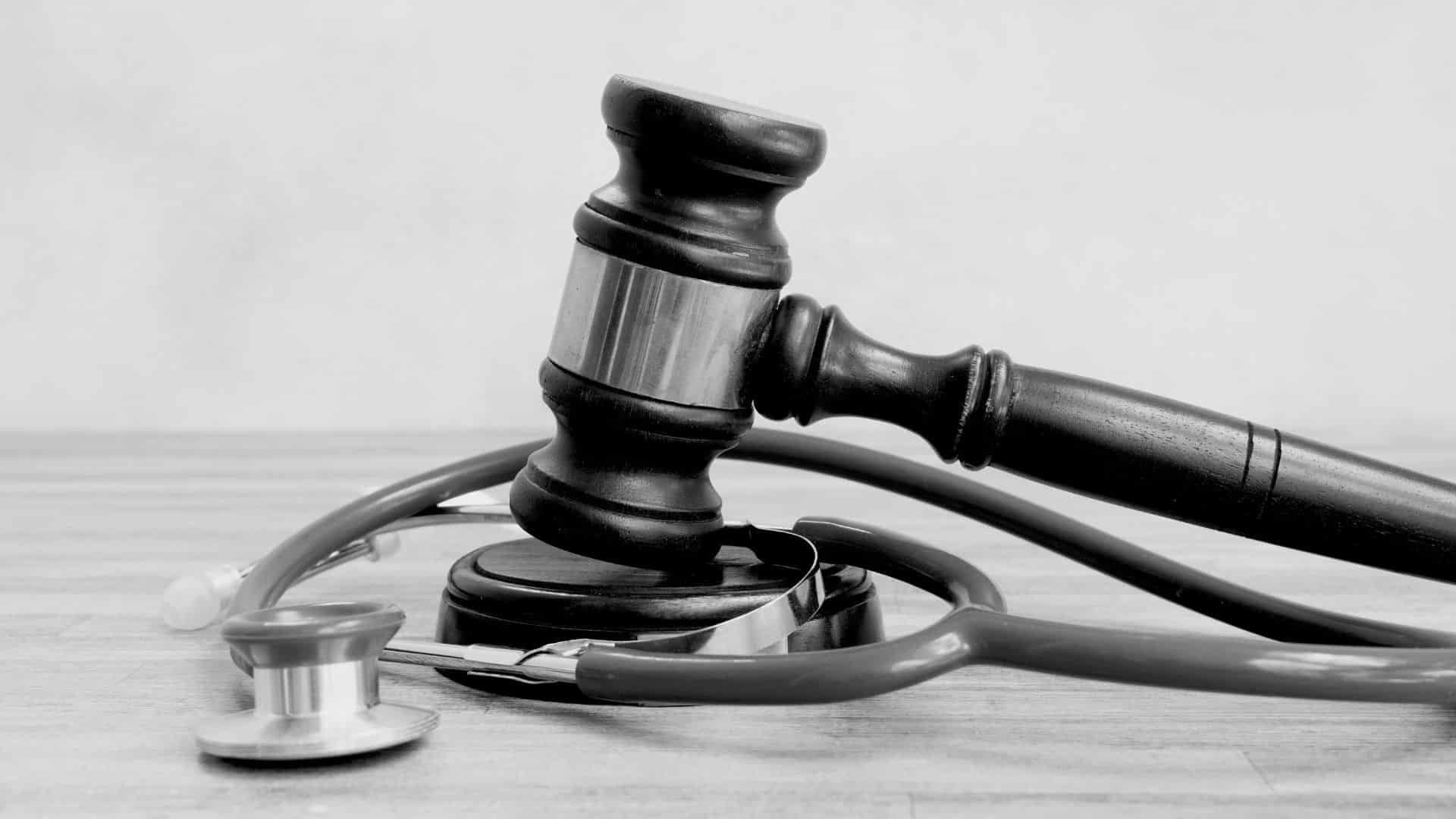 gavel with a stethoscope around it