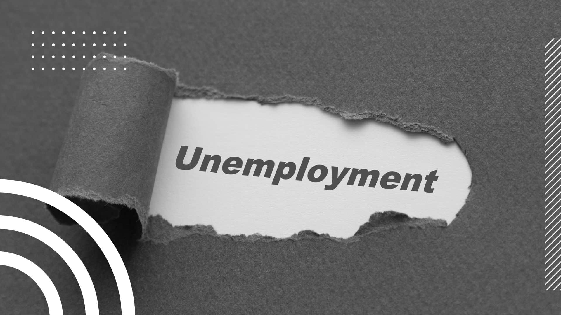black and white — folder with a rip, revealing paper underneath that reads "unemployment"