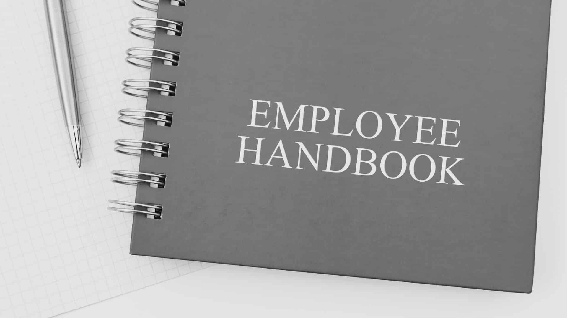 employee handbook on a on a desk